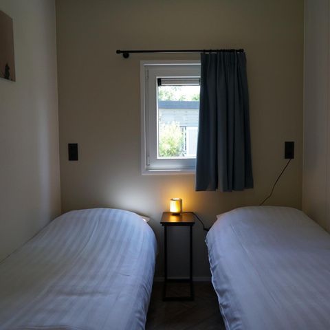 Lodge 4 personen - Dijk met Hottub & Sauna