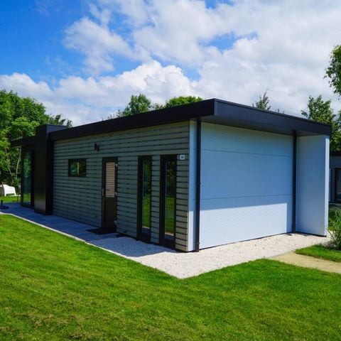 Lodge 4 personen - Dijk met Hottub & Sauna