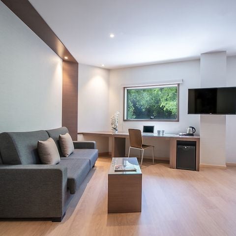 Slaapkamer 2 personen - Hotelkamer Junior Suite (2 adults + 2 children)