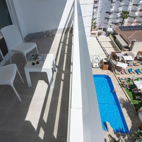 Slaapkamer 3 personen - Junior Suite - Zeezicht - Balkon