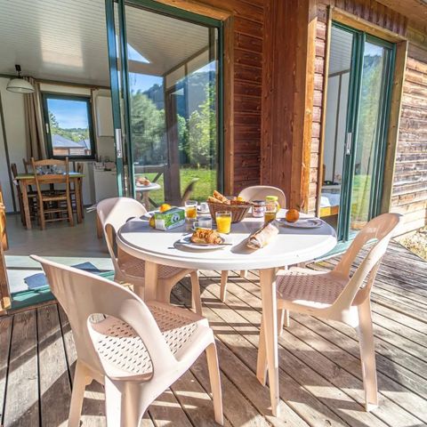 Chalet 6 personen - Chalet in HARMONIE met de natuur - 31m² - 2 kamers met uitzicht op de rivier