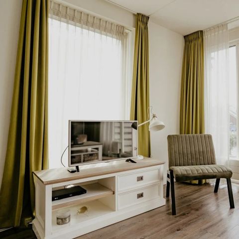 Appartement 6 personen - Luxe waterappartement Uitgeest met privé terras