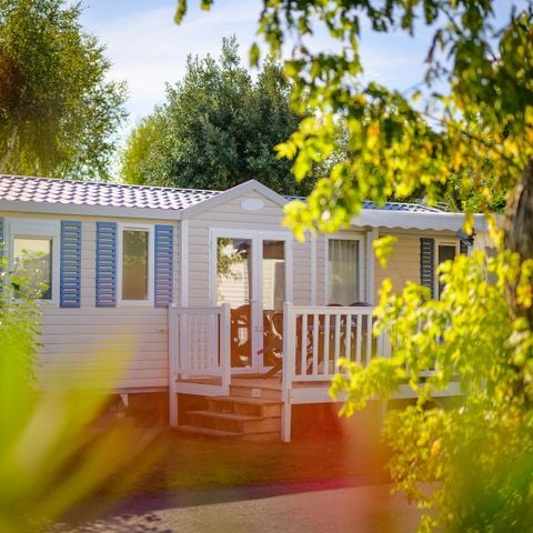 Stacaravan 6 personen - DIM - LOISIR CONFORT 3ch/ 6p - 36m² - Overdekt terras