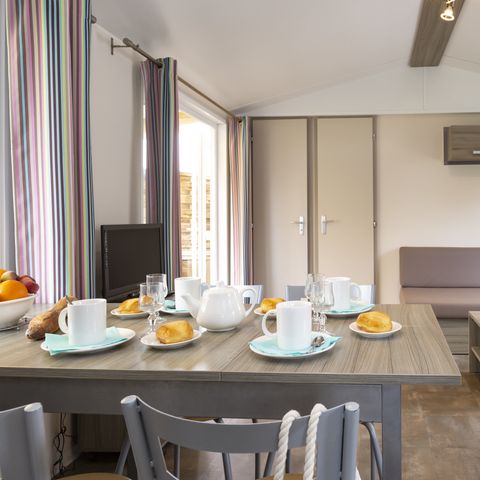 Stacaravan 7 personen - Premium 32m² - 3 kamers - overdekt terras - TV + vaatwasser + lakens + handdoeken