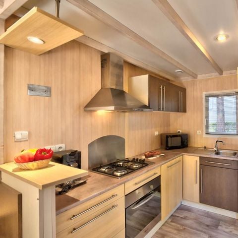 Chalet 4 personen - Comfort Cottage met airco - 2 slaapkamers - COMFORT CLIM - 32 tot - 43 m² - Airco - Tv - Vaatwasser - Plancha