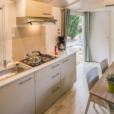 Stacaravan 4 personen - Mobile-home | Comfort | 2 Slaapkamers | 4 Pers. | Verhoogd terras | Airconditioning.