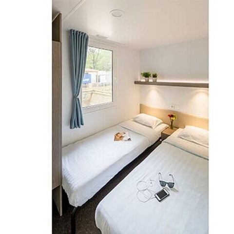 Stacaravan 4 personen - Mobile-home | Comfort | 2 Slaapkamers | 4 Pers. | Verhoogd terras | Airconditioning.