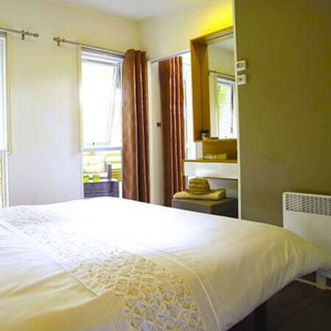 Stacaravan 6 personen - Ultiem | 3 slaapkamers | 6 pers | Verhoogd terras | 1 badkamer | Airconditioning