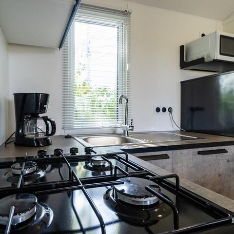 Stacaravan 5 personen - Stacaravan Evasion 28.5m² (2 kamers) (- 8 jaar) + TV + Terras / Woensdag tot Woensdag