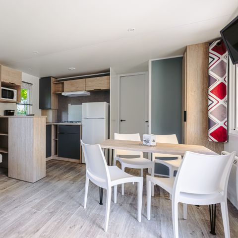 Stacaravan 5 personen - Stacaravan Evasion Plus 28.5m² (2 kamers) (- van 3 jaar) + TV + Terras + Airco + Afwasmachine 4/5 pers