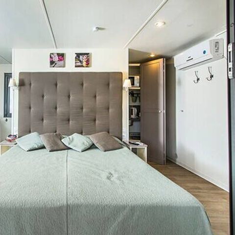 Stacaravan 2 personen - Comfort | Studio | 2 personen | Verhoogd terras | 1 badkamer | Airconditioning