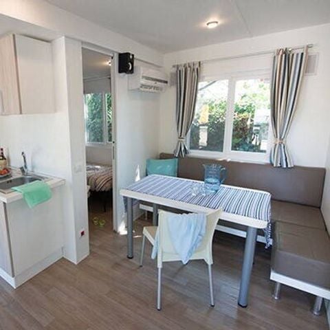 Stacaravan 4 personen - Mobile-home | Comfort | 2 slaapkamers | 4 pers. | Verhoogd terras | 2 badkamers | Airconditioning.