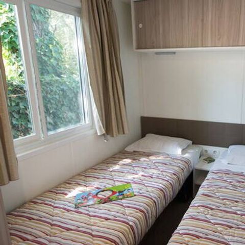 Stacaravan 4 personen - Mobile-home | Comfort | 2 slaapkamers | 4 pers. | Verhoogd terras | 2 badkamers | Airconditioning.
