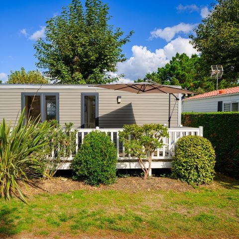 Stacaravan 6 personen - COMFORTABELE COTTAGE met 3 slaapkamers - 35 m² - terras met parasol, geschikt voor 6 personen