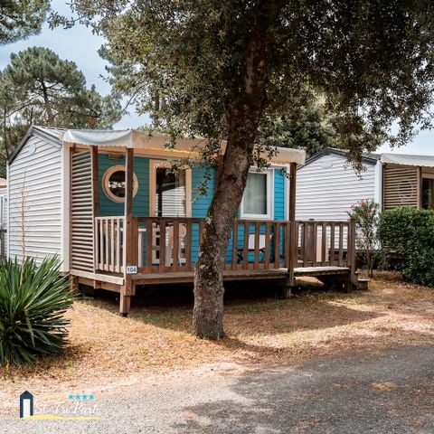 Stacaravan 2 personen - Comfort stacaravan 18.60 m² (1 slaapkamer) + halfoverdekt houten terras