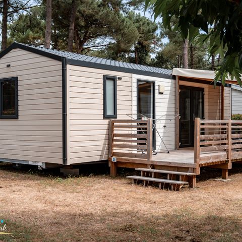 Stacaravan 4 personen - 31m² Premium stacaravan (2 kamers) + vaatwasser + 15m² halfoverdekt terras