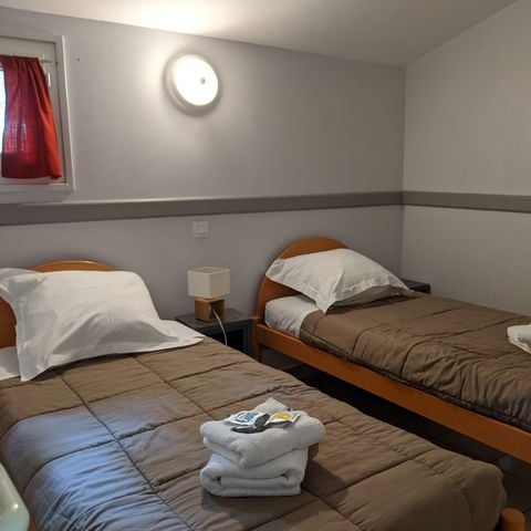 VAKANTIEHUIS 6 personen - Paviljoen 6- 1 slaapkamer + 1 slaapcabine + terras + airconditioning + TV - 40m².