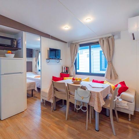 Stacaravan 6 personen - Premium | 3 Slaapkamers | 6 Pers | Verhoogd terras | Airconditioning | TV