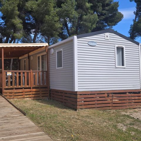 Stacaravan 4 personen - Stacaravan PMR | Comfort | 2 Slaapkamers | 4 Pers | Verhoogd terras | Airconditioning | TV
