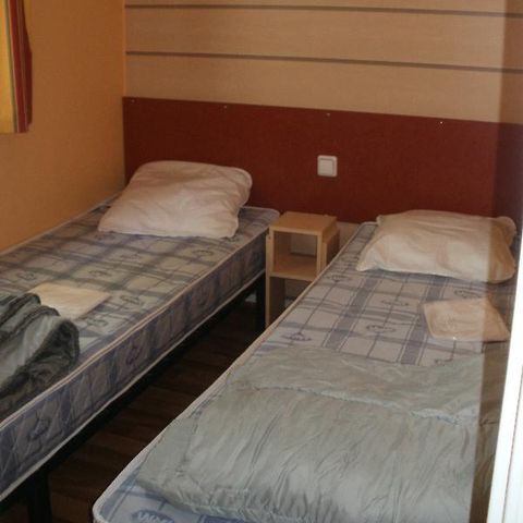 Stacaravan 4 personen - Comfort 26m² (2 kamers) + 10m² overdekt terras
