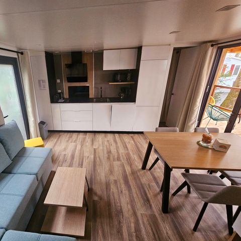 Stacaravan 8 personen - Premium 30-40m² - 3 kamers + TV + Overdekt terras & Bedlinnenpakket aanwezig