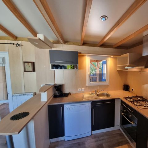 Chalet 6 personen - 58m² - 3 slaapkamers - 2 badkamers - overdekt terras + airconditioning + TV + LV + oven* + oven