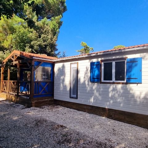 Chalet 6 personen - 58m² - 3 slaapkamers - 2 badkamers - overdekt terras + airconditioning + TV + LV + oven* + oven