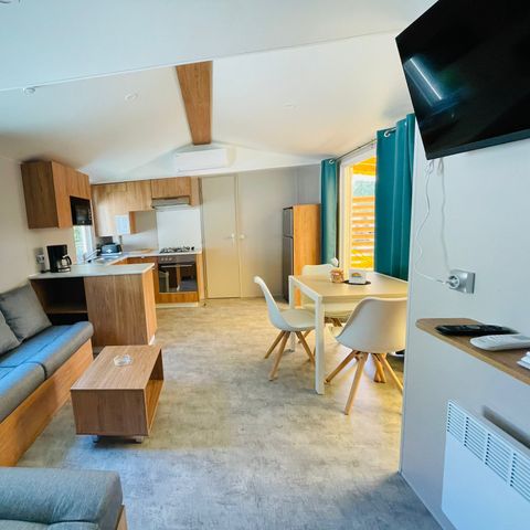 Stacaravan 8 personen - Premium 30-40m² - 3 kamers + TV + Overdekt terras & Bedlinnenpakket voor eenmalig gebruik* *)