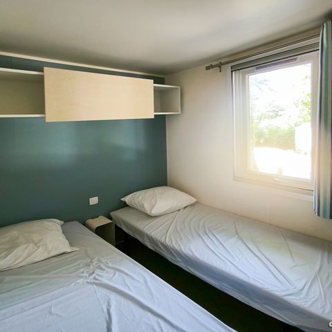 Stacaravan 4 personen - Standaard 32m² - 2 kamers + 12m² overdekt terras