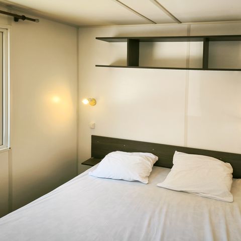 Stacaravan 4 personen - Confort 32m² - 2 kamers + terras + TV + Air-Con -