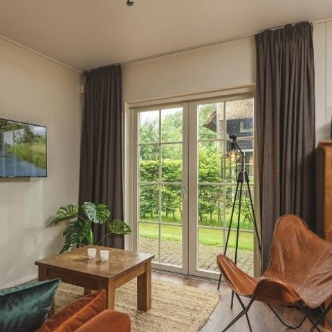 Bungalow 5 personen - Reggehooiberg met sauna en hottub