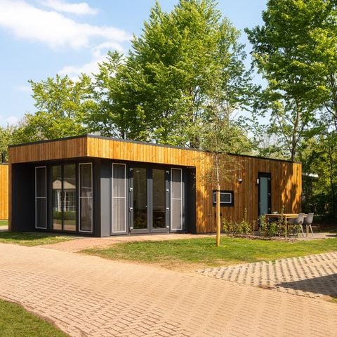 Groepsaccommodatie 28 personen - 7x Happy Oak Lodge (met Hottub)