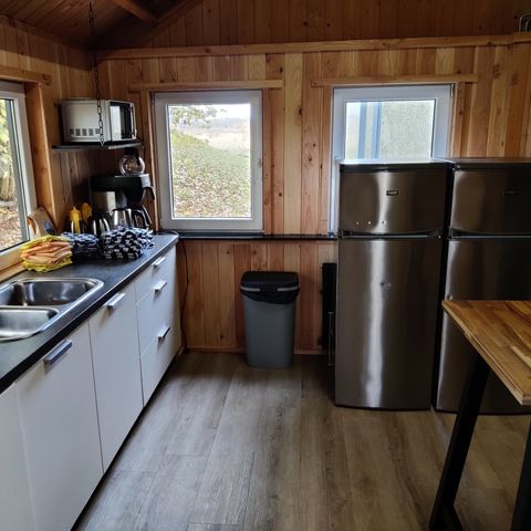 Tiny House 16 personen - Groepsverblijf blokhut + 4 vierpersoons tiny houses (16 personen)