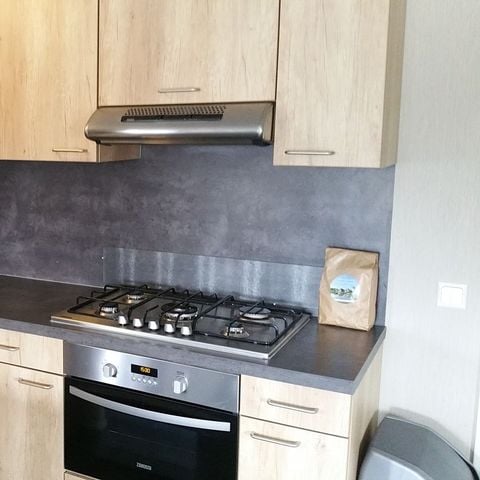 Lodge 16 personen - Groepsverblijf groepslodge + 4 vierpersoonslodges (16 personen)