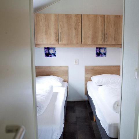 Lodge 16 personen - Groepsverblijf groepslodge + 4 vierpersoonslodges (16 personen)