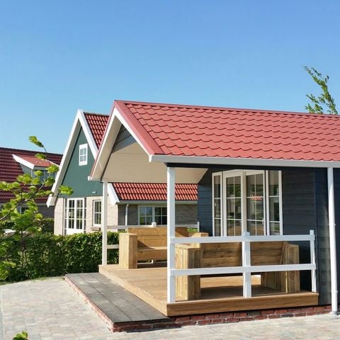 Lodge 16 personen - Groepsverblijf groepslodge + 4 vierpersoonslodges (16 personen)
