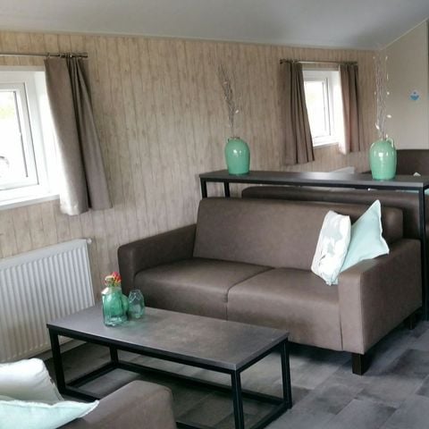 Lodge 16 personen - Groepsverblijf groepslodge + 4 vierpersoonslodges (16 personen)