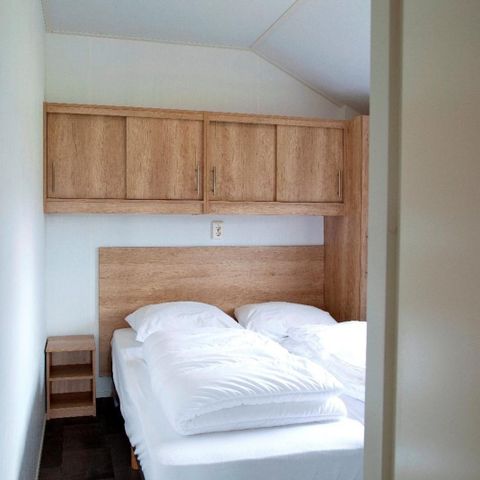 Lodge 16 personen - Groepsverblijf groepslodge + 4 vierpersoonslodges (16 personen)