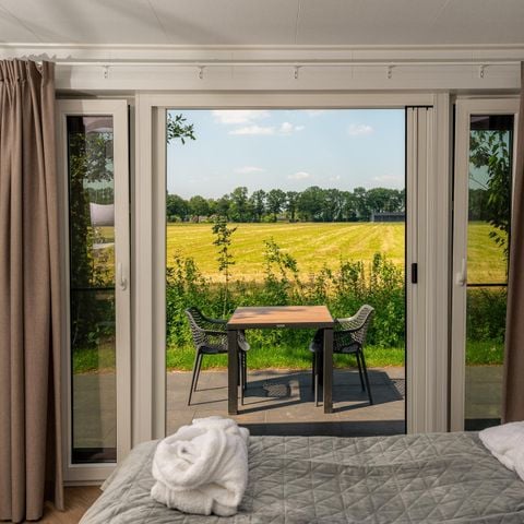 Lodge 2 personen - Panorama Wellnesslodge | jacuzzi, sauna en sunshower