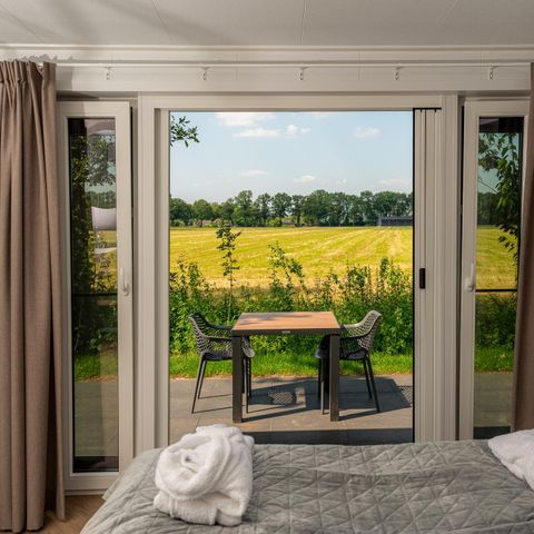 Lodge 2 personen - Panorama Wellnesslodge | jacuzzi, sauna en sunshower