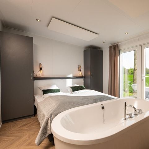 Lodge 2 personen - Panorama Wellnesslodge | jacuzzi, sauna en ligbad