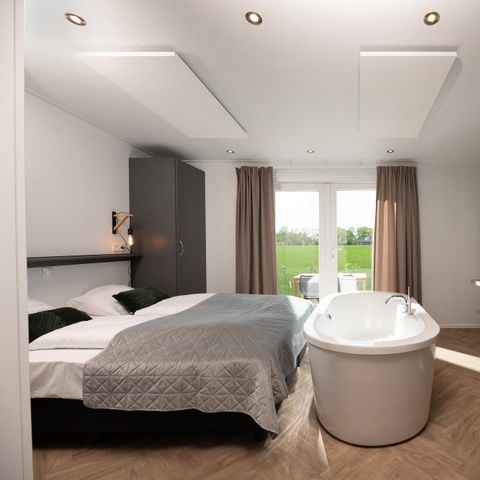 Lodge 2 personen - Panorama Wellnesslodge | jacuzzi, sauna en ligbad