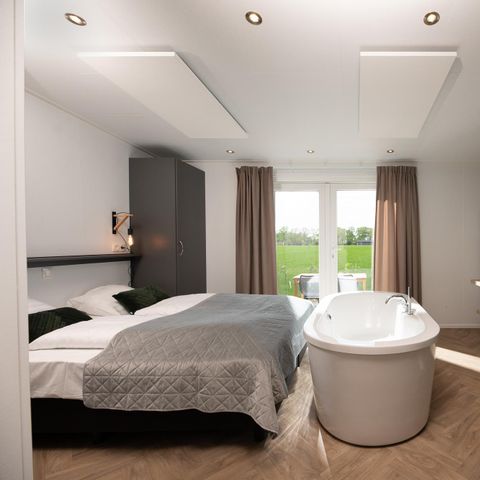 Lodge 2 personen - Panorama Wellnesslodge | jacuzzi, sauna en ligbad