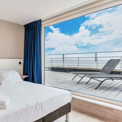 Groepsappartement 10 personen - Unieke penthouse met zeezicht