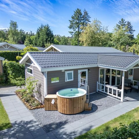 Lodge 4 personen - Wellness Cottage met privé Hottub en Sauna