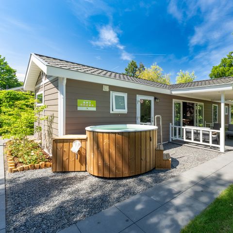 Lodge 4 personen - Wellness Cottage met privé Hottub en Sauna