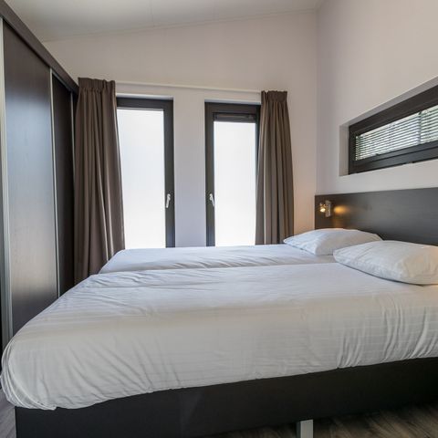 Bungalow 4 personen - Bos Lodge 55 met Jacuzzi