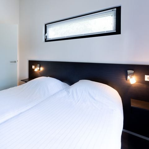 Bungalow 4 personen - Bos Lodge 55 met Hottub