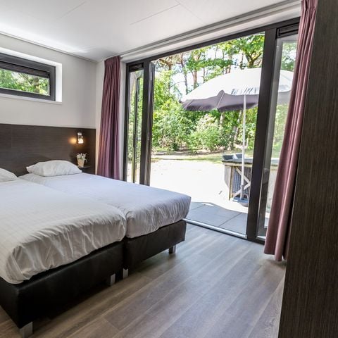 Bungalow 6 personen - Bos Lodge 75 met Hottub en Sauna