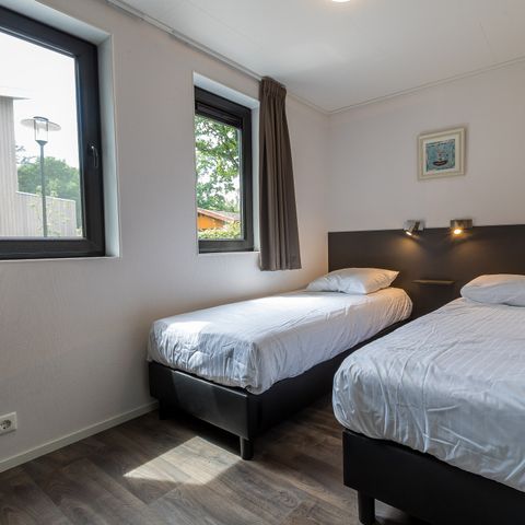 Bungalow 6 personen - Bos Lodge 75 met Hottub en Sauna